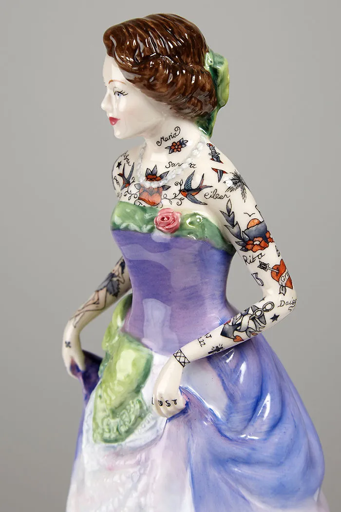 These Porcelain Dolls Look Perfectly Traditional Except For Their Sailor Tattoos