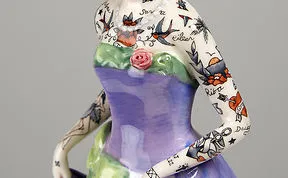 These Porcelain Dolls Look Perfectly Traditional Except For Their Sailor Tattoos