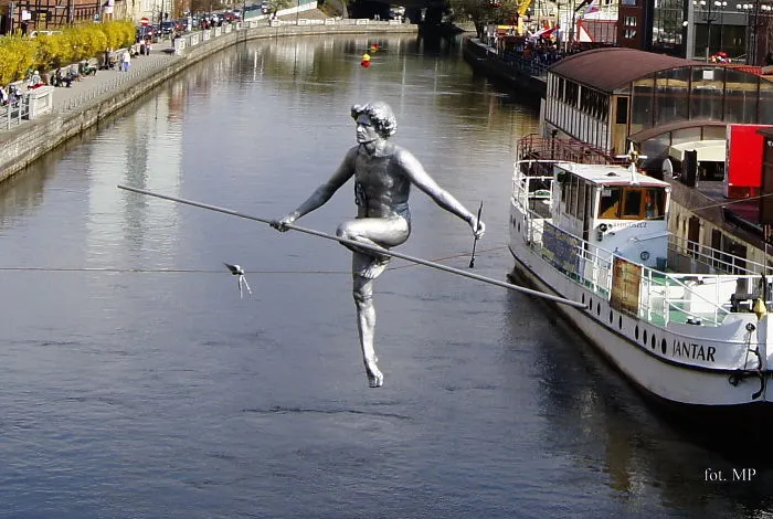 Bydgoszcz, Poland.  "man Crossing The River"