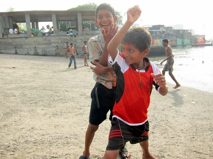 Kids In Mumbai Playing On Beach - Onur Kaya