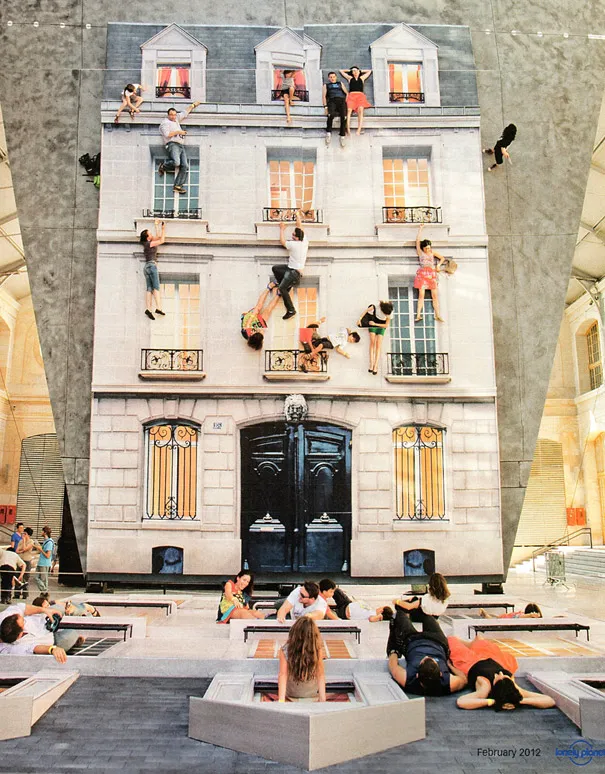 Giant Mirrored Building Facade Turns Visitors Into Spiderman