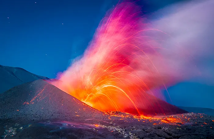 Photographer Captures Volcanic Eruption In Chile With Red-Hot Magma And Flashing Lightning