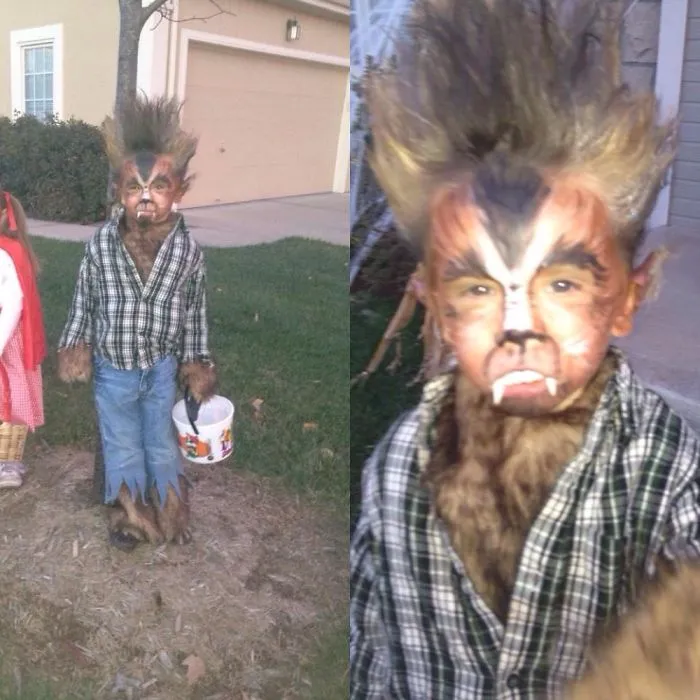 Child in detailed werewolf costume with face paint and wig outdoors, perfect for children's Halloween costume ideas.