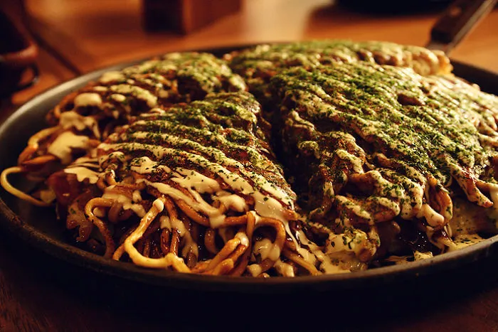 Okonomiyaki With Asian Noodle In Japanese