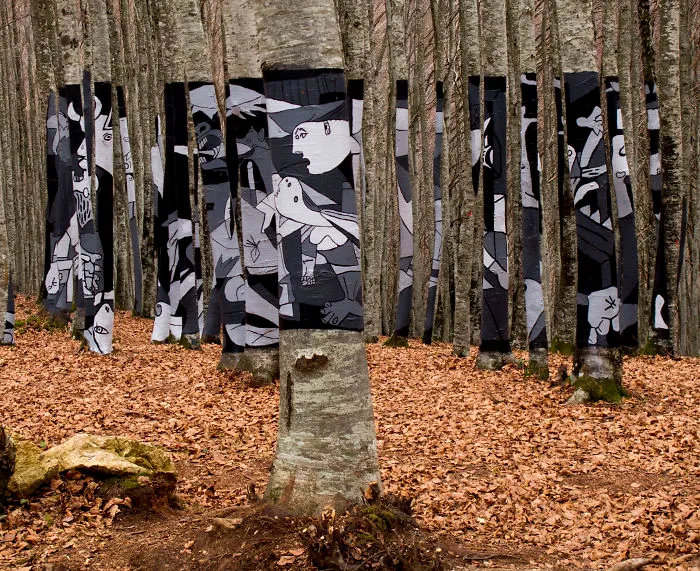 Picasso's "guernica In The Woods", With Bio Paint In Protest Plans To Destroy The Forest. Spain