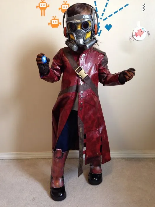 Child in detailed Star-Lord costume wearing mask and red coat, showcasing children's Halloween costume ideas for boys and girls.