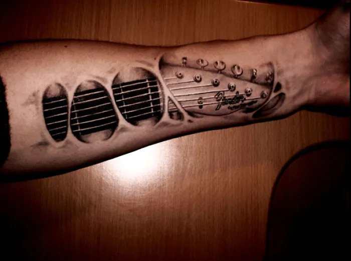 3D tattoo of a guitar neck on an arm, creating a mind-twisting visual effect with realistic depth.