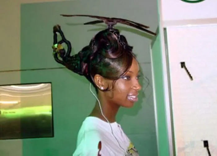 Woman with a helicopter-shaped haircut in a creative and unique style, showcasing one of the craziest haircuts ever.