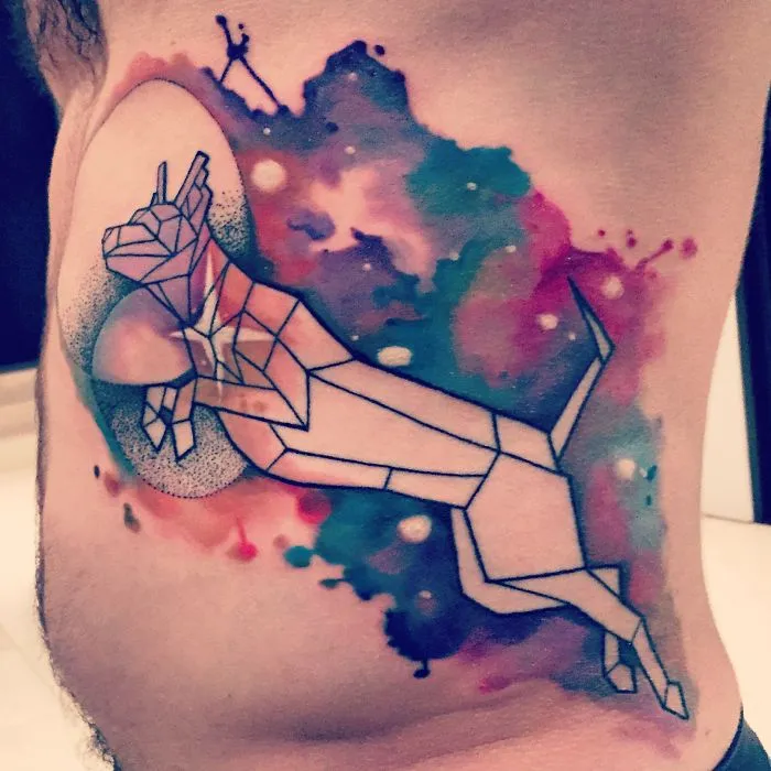 Colorful cosmic tattoo of a geometric dog on the cheekbone, perfect for astronomy lovers.