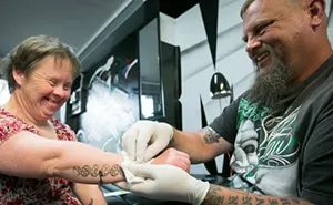 Tattoo Artist Gives Woman With Down Syndrome Free Tattoos Every Friday