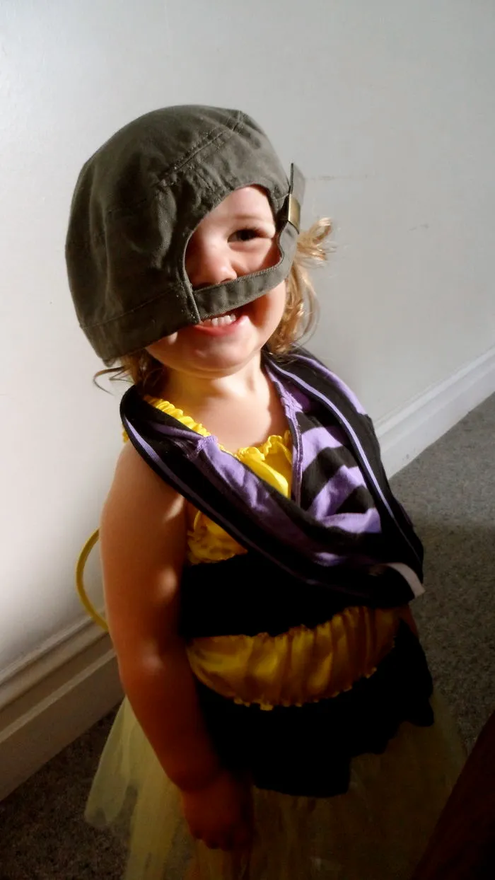 Little New Zealand Girl Delighted With Her Outfit.