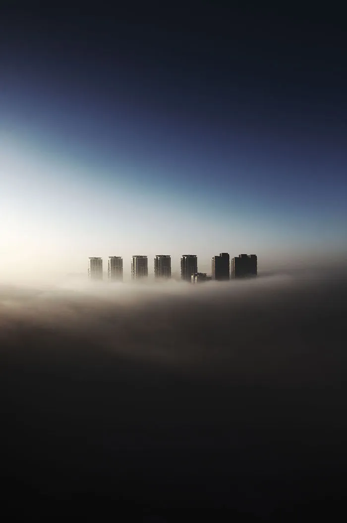 Smog Particles Mix With Fog And Settle At Ground Level In An Early Morning Freeze - Tianjin.