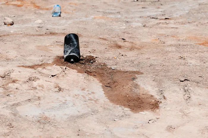 Discarded Chemicals Seep In To The Soil - Pamir Mountain Range, Xinjiang.