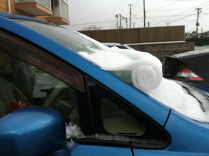 Snow On My Car Windshield Rolled Itself Up