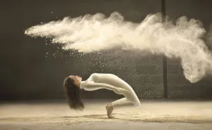 Photographer Freezes Dancer In Time As She Spins Through Clouds Of Powder