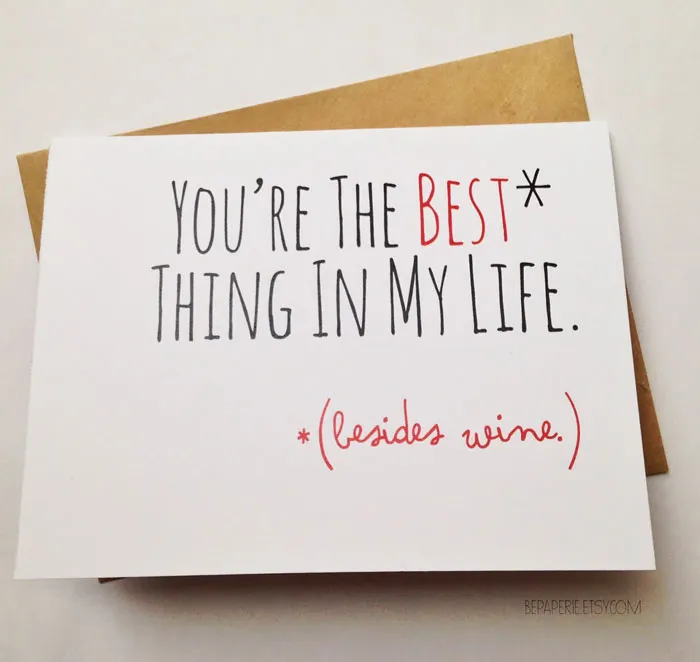 Unconventional Valentine's Day card with humorous message about love and wine.