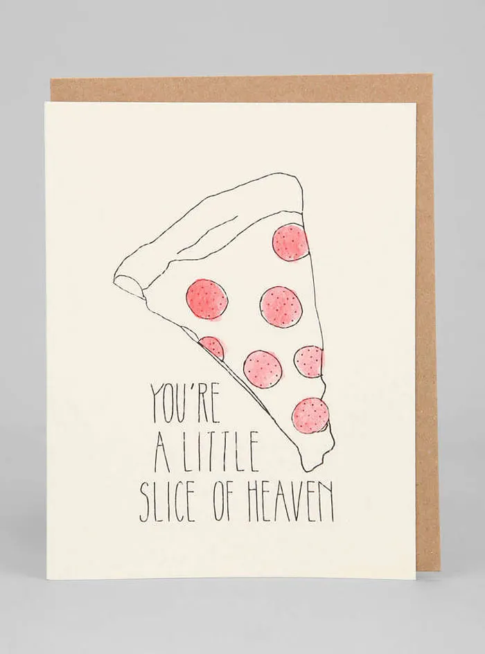 Valentine's Day card with a pizza slice illustration and the message "You're a little slice of heaven."