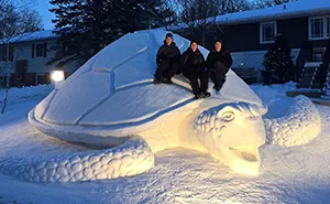 Every Year, These 3 Brothers Make A Giant Snow Sculpture In Their Front Yard