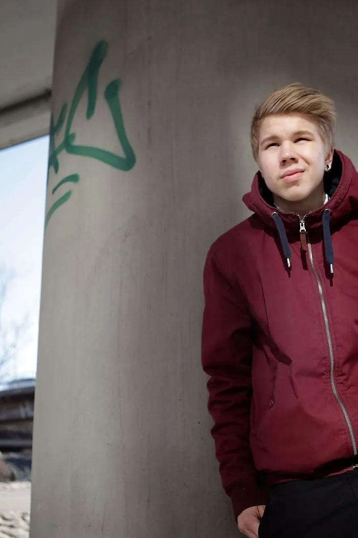 A Finnish Young Man Facing A Windy October Day.