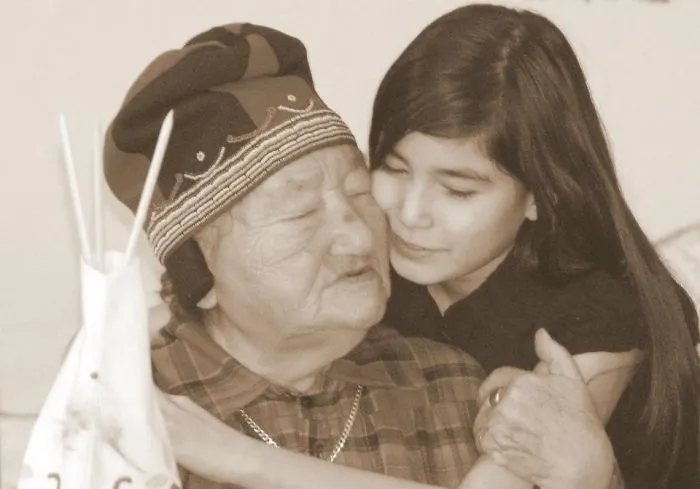 Native Innu Elder And Her Grand Daughter