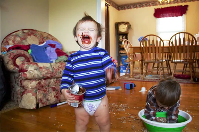 The Little Ones Sneak Into The Pantry And Find A Container Of Frosting