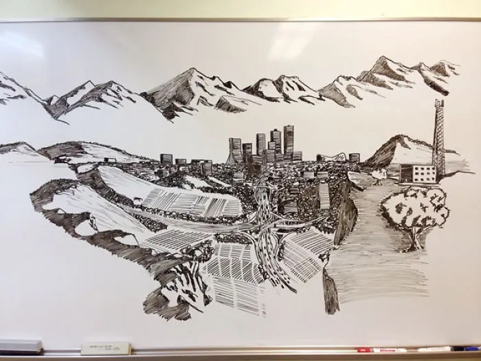 Teacher Doodles On A Whiteboard In His Free Time