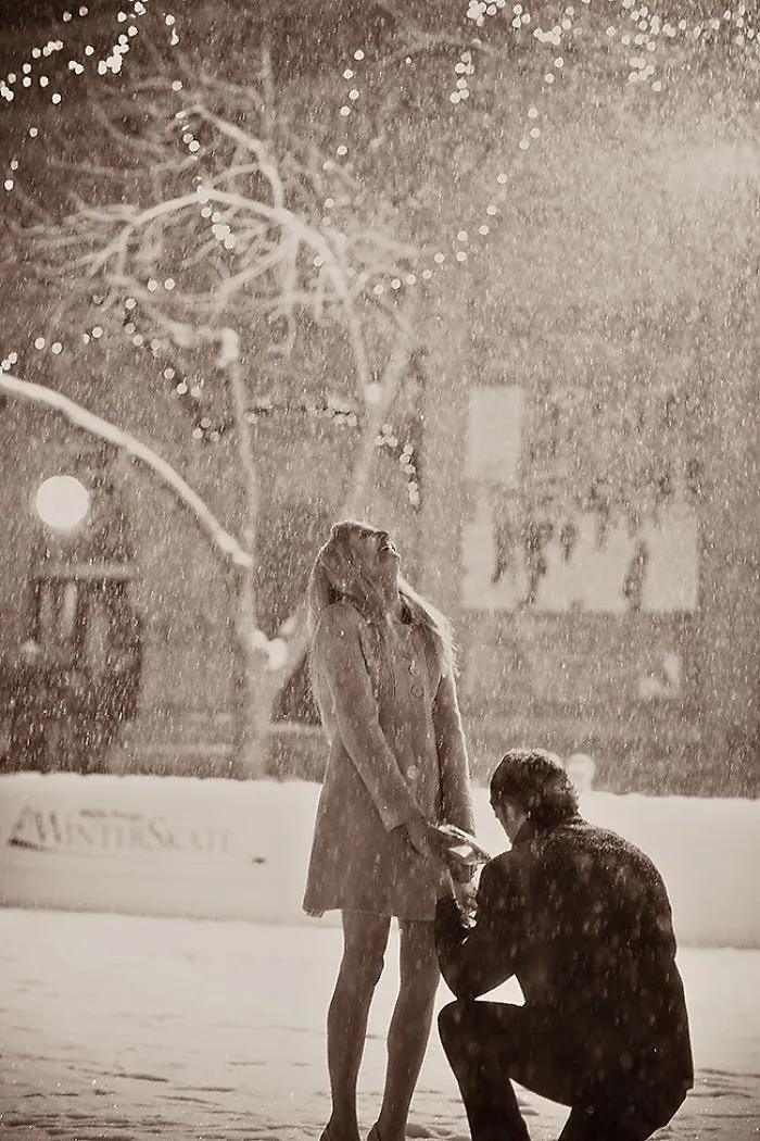 He opened the doors to the ice skating rink and there was a red carpet laid on the ice with a box at the end.