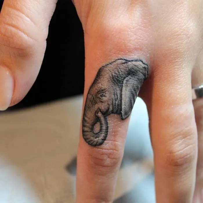 Elephant Finger Tattoo