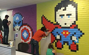 Worker Uses 8,024 Post-It Notes To Turn Boring Office Walls Into Superhero Murals