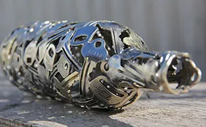 Artist Turns Old Keys And Coins Into Recycled Art
