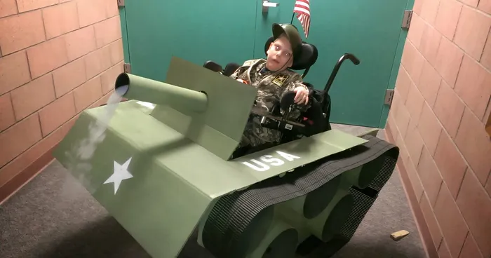 Step-Father Turns His 6-Year-Old Son With A Wheelchair Into A Tank For Halloween