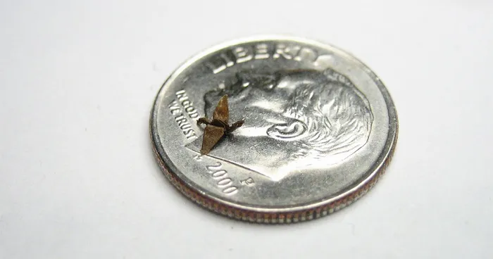 Unbelieveably Tiny Pieces Of Origami That Fit On The Tip Of Your Finger