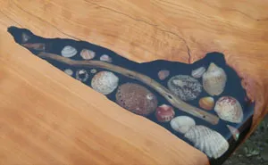 Artists Fill Tables' Cracks With Sea Shells, Stones And Starfish