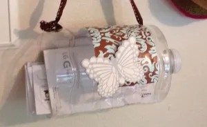 Recycled Water Container Transformed Into Mail Holder