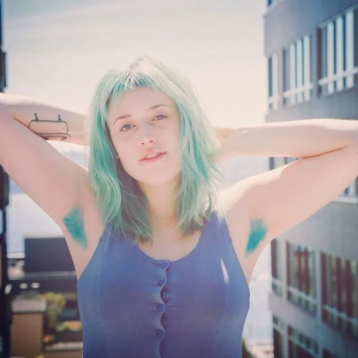 Woman Showing Her Armpit Hair
