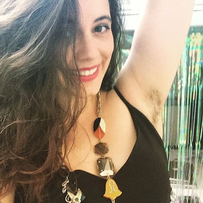 Woman Showing Her Armpit Hair