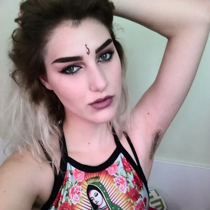 Woman Showing Her Armpit Hair