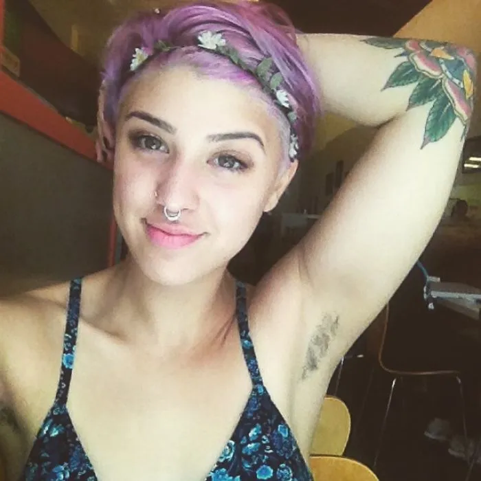Woman Showing Her Armpit Hair
