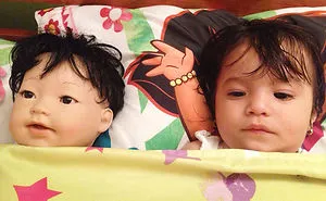 48 Babies Who Look Just Like Their Toy Dolls