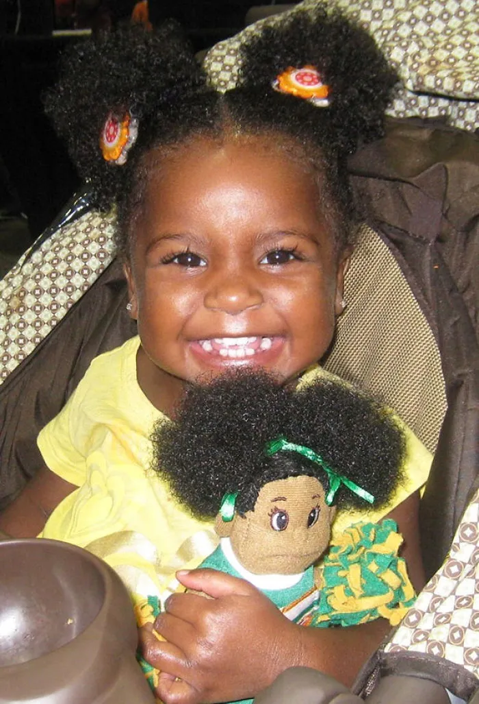 Girl And Look Alike Doll