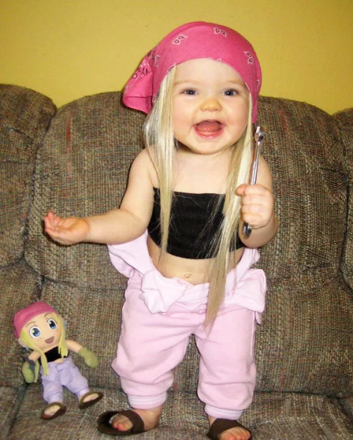 Girl With Her Look Alike Doll