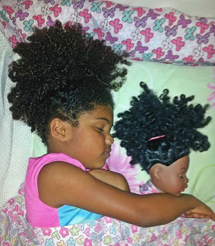 Girl With Her Look Alike Doll