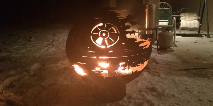  84-Year-Old Grandpa Creates A Metal Death Star Firepit For His Grandchildren