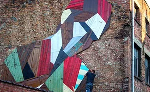 Artist Turns Old Wooden Doors Into Giant Street Art Murals