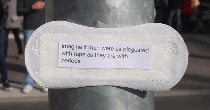 A Woman Is Posting Feminist Messages Written On Period Pads All Over Her City