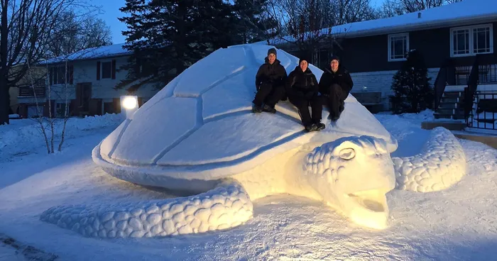 Every Year, These 3 Brothers Make A Giant Snow Sculpture In Their Front Yard