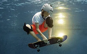 I Photograph Kids Playing Their Favorite Sports Underwater