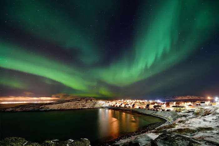 Aurora Over The Small Fishing Village Bugøynes