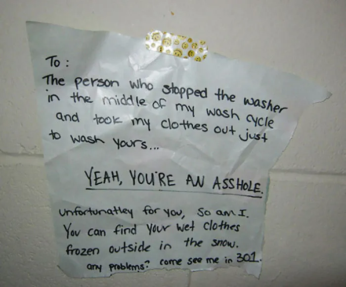Wrapping-Paper Note Stuck To The Wall With A Band-Aid