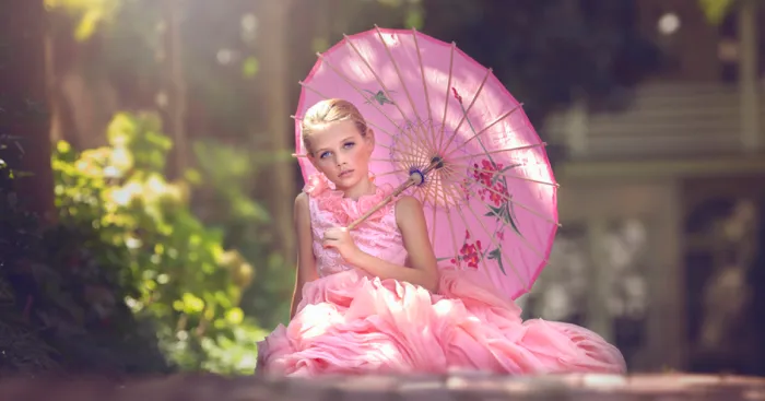 Adorable Photos Of A Little Girl In Pink